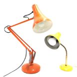 Two retro desk lamps, comprising an orange finish Anglepoise lamp, approximately 68cm high when full