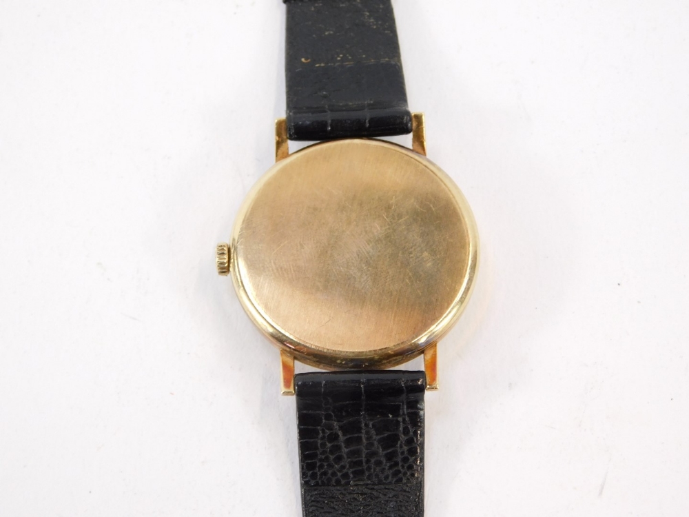 A Longines 9ct gold gent's wristwatch, with a silver coloured dial, with four point number section a - Image 2 of 3