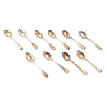Nine various silver teaspoons, comprising a set of six silver Fiddle pattern spoons bearing the init