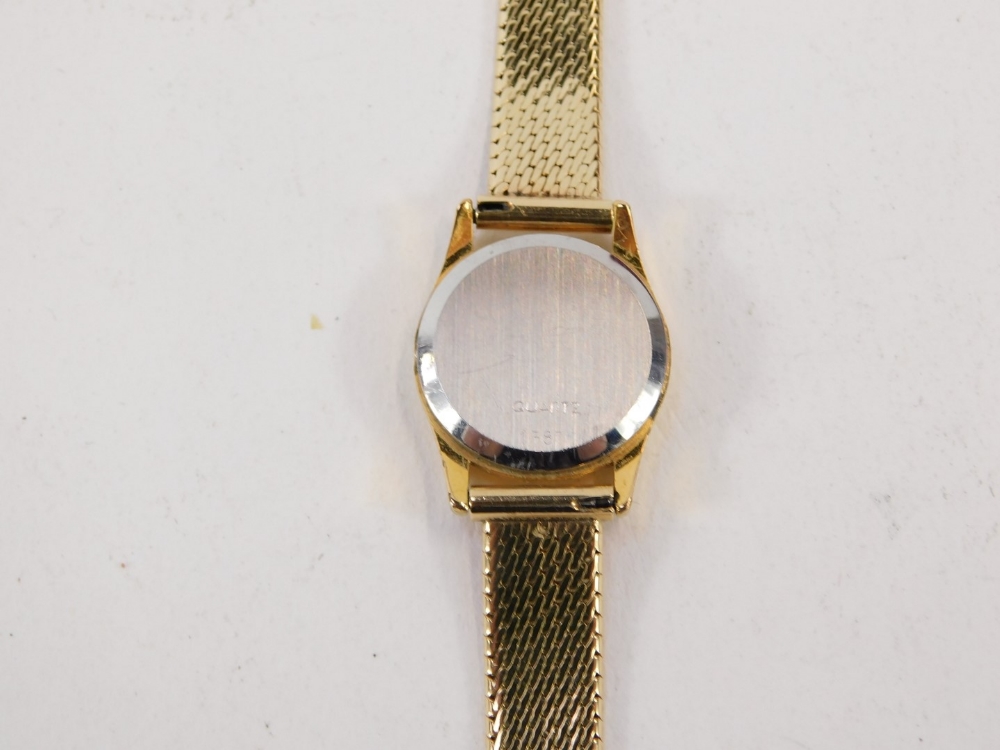 A 9ct gold Omega De Ville lady's wristwatch, with circular watch head, with 1.5cm dial, on bar set b - Image 3 of 5