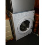 A Hotpoint 8kg washer/dryer, model WDAL 8640.
