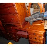 A Ducal pine dressing table, stool and mirror. (3)