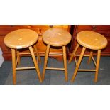 A set of three beech stools.