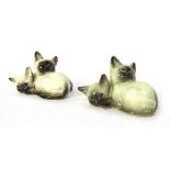 Two Beswick Siamese Cat groups, one stamped No 1296, the other stamped Beswick England black back st