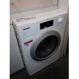 A Miele W1 series 120 9kg washing machine.