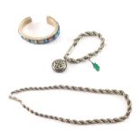 Various jewellery and effects, a heavy C-scroll bangle set with turquoise, peach and purple stones,