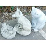 Three composition garden ornaments, one in the form of a cat and kittens and a fox etc.