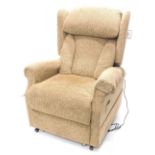 An electric raise and fall CosiChairs reclining armchair, with tweed type fabric, original cost £1,9