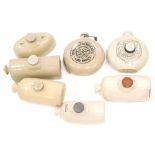 Various stoneware hot water bottles, adaptable hot water bottle, numbered 8, 25cm high, others with