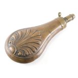 An early 20thC copper and brass powder flask, with tear drop body, raised with fern leaves, 20cm hig