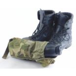 A pair of Goretex Vibram boots in black, and an field water bottle, in army camouflage case. (3)