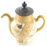 A Victorian TF&S Royles patent self pouring tea pot, raised with leaves and branches with shaped lid