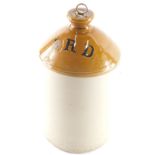 A Service Reserve Depot two coloured stoneware rum bottle, stamped to the neck with stopper, 38cm hi