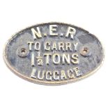 An NER cast iron railway wagon sign, to carry 1½ tonnes luggage, in white and black, 21cm wide.