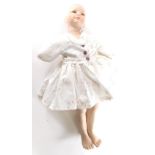 A Fine Hobby bisque headed doll Heidi, with fixed eyes, closed mouth, articulated limbs, partially c