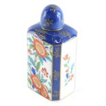 A late 19thC Royal Worcester tea caddy, in blue with panels of flowers with gilt highlights, crescen