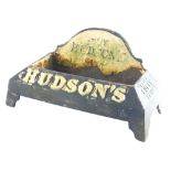 A Hudson's soap puppy drink cast iron advertising water trough, with raised lettering in black and w