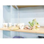 A collection of ceramics to include World of Beatrix Potter mugs, a Wedgwood Peter Rabbit mug, a han