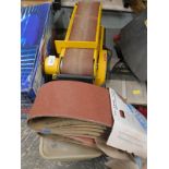 A Wolf electric belt sander, belts, etc.