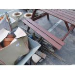 Various plant pots, wheelbarrow, two metal vices, spirit level, other hand tools and a garden bench,