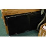 A LG 28" LED TV, boxed with cable and remote.