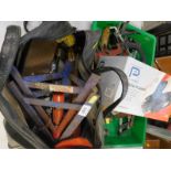 A collection of tools to include, clamps, a power planer, hammers, etc.