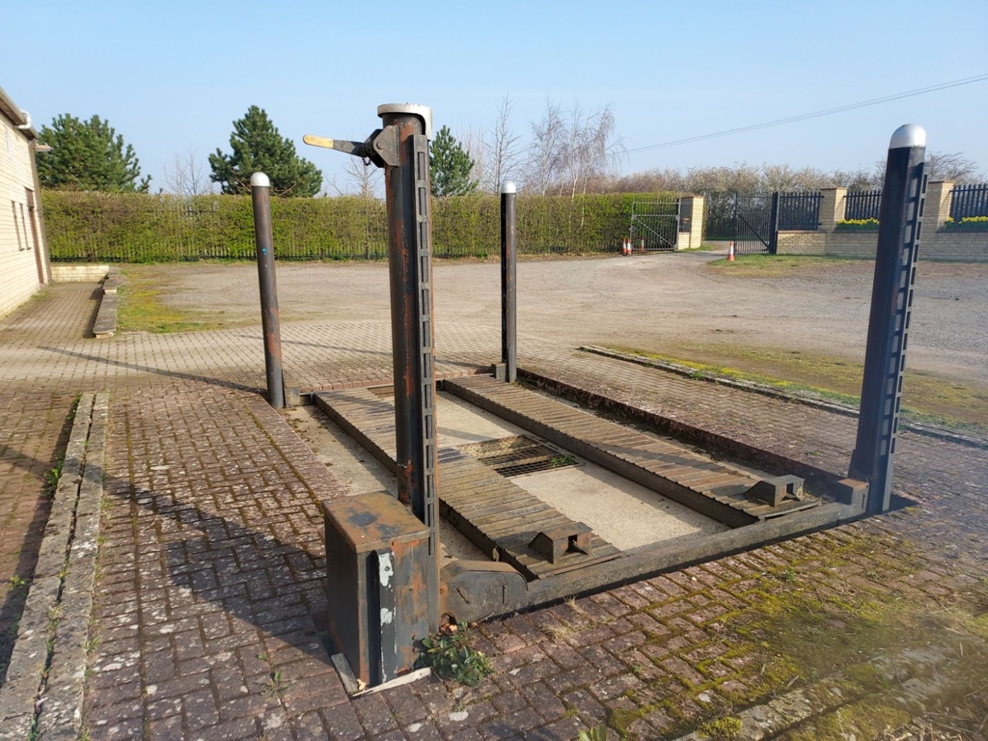 An outdoor 3 ton Bradbury 4 post vehicle lift, 3 phase. - Image 2 of 4