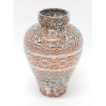 An agate ware studio pottery vase, with a marbled decoration, impressed marks beneath, 29cm high.