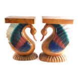 A pair of heavily carved wooden duck vase stands, partially painted, 57cm high.