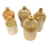 Various stoneware jars, one marked RE Prodgeers, numbered 583, with cork stopper, 38cm high, another