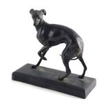 A spelter figure of a greyhound, with foot raised, on plain rectangular base, unsigned, 18cm high.