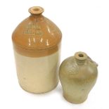 An early 20thC two coloured stoneware jar, impressed 247 Edmonds Stamford, 45cm high, and a 19thC fl