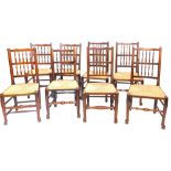 A harlequin set of eight Lancashire type spindle back dining chairs, comprising five 19thC chairs an