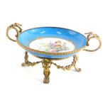 A late 19thC Sevres style dish, with metal work frame entwined floral handles and feet joined by gar