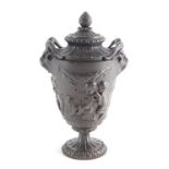 A 19thC bronze Grand Tour two handled vase, of classical form, with acorn finial and ram head handle