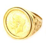 A George V full gold sovereign, 1911, in a basket weave ring setting, marked .375, size W, 17g all i