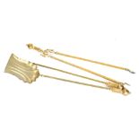 A Regency style brass fireside companion set, to include coal tongs 58cm high, etc. and an African t