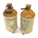 A 20thC two coloured stoneware flagon, with tap to the front WM Bill and Son Grimsby Limited, with m