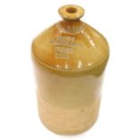 An early 20thC two coloured stoneware jar, impressed JR Lowe Wine and Spirit Merchants Stamford, sta