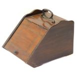 A late Victorian walnut coal scuttle, of wedge shape with hinged lid and bronzed metal handle, 32cm