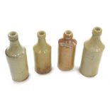 A 19thC stoneware bottle, impressed G. E. Fancourt Stamford, 18cm high, another bottle E. Elger Port