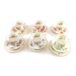 Various Royal Albert Flowers of the Month series trios, to include February cup, 7cm high, saucer an