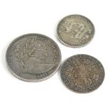 Various coins, a George IV shilling, 1825, a George III shilling, 1787, a George III half crown with
