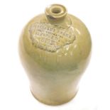 A 19thC stoneware jar, with raised rosette M. Bellamy and Sons Spirit Merchants Sleaford 662, impres