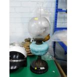 A late Victorian oil lamp, with clear funnel, florally etched orb shade, moulded turquoise glass res