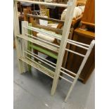 A collection of painted and stripped pine towel rails.