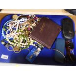 Various costume jewellery, beads, necklaces, etc., an autograph book containing various poetry ditti