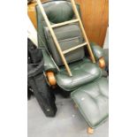 A green leather swivel armchair and stool, Antler suitcase, and a towel rail.