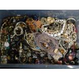 Various costume jewellery, beads, necklaces, bracelets, etc. (a quantity)