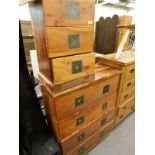 A hardwood chest of four drawers, a similar bedside chest of three drawers.